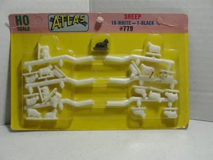 Atlas #779 HO Toy Train Scale Sheep 18 - White 1 - Black NOS - Bild 1 von 1