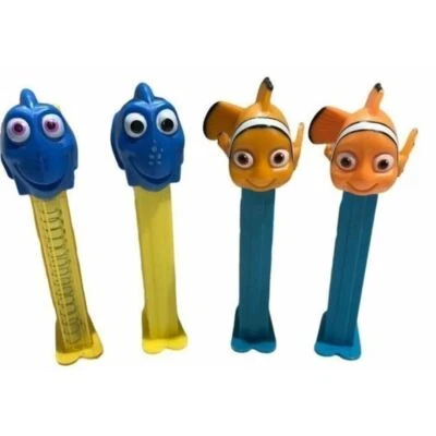 Disney Buscando a Nemo Pez Dispensador De Colección 2 Nemo y 2 Dori un Vástago Transparente Foto 1 de 4
