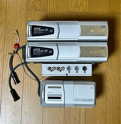 ALPINE CHA-S634 CD Changer x2 & MHA-S670 MD Changer with KCA-410C Terminal Box - Image 1 of 4