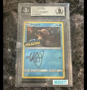 KATHRYN NEWTON SIGNED Pokémon Psyduck SM199 Black Star Promo Holo [[STAMPED]] j - Picture 1 of 3