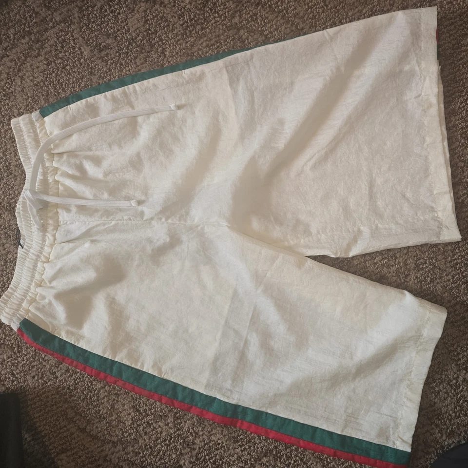 NUEVO CON ETIQUETAS GUCCI PANTALONES CORTOS CINTURA ELÁSTICA RAYAS LATERALES TALLA XXS Foto 1 de 4