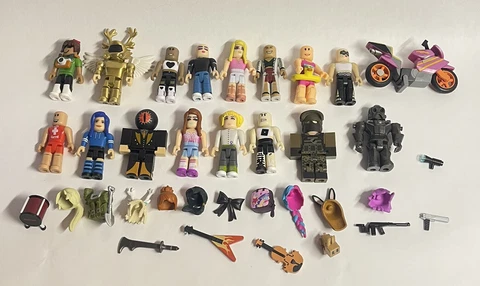 Roblox Toys Action Figures Lot Of 16 Figures w/ Accessories and Motorcycle game Cover