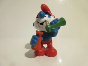 20164 Schleich Puffi: Papà Puffo Con Labglasses (Orange-Green) Rif. : 1E231 - Picture 1 of 8