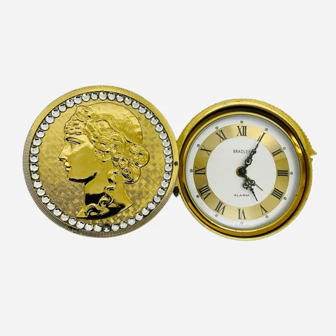 VTG Elgin Bradley Travel Coin Alarm Clock World Time Round Embossed Lady Face Cover
