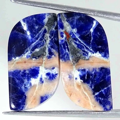 24.40 克拉天然蓝色索达石散装宝石凸圆形一对花式 12x25x5 毫米 — 第 1/4 张图片