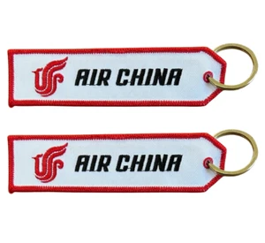 13409 AIR CHINA CHINESE AIRLINE RBF REMOVE BEFORE FLIGHT AVIATION FABRIC KEYRING - Picture 1 of 1