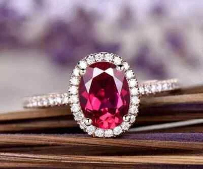 Anillo de compromiso para mujer de corte ovalado de 2 quilates con rubí rojo creado en laboratorio enchapado en oro rosa de 14 quilates Foto 1 de 4