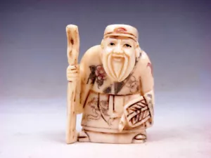 Japanischer hochdetaillierter handgefertigter Netsuke alter Mann hält Stockventilator #08102210 - Bild 1 von 6