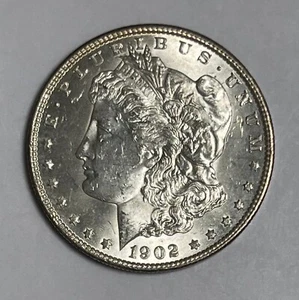 1902-O Morgan dollar (#16243) BU+ obv face scr. Nice luster. - Picture 1 of 2