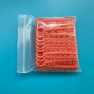 Ortodoncia dental ligadura lazos aparatos ortopédicos bandas elásticas anillo naranja 2 paquetes - Imagen 1 de 5
