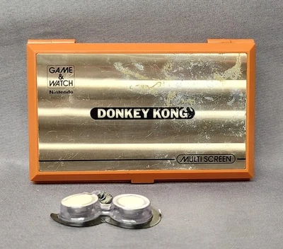 Nintendo Donkey Kong gioco e orologio 1982 DK-52 multi schermo con batterie FUNZIONANTE  - Immagine 1 di 4