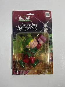 De colección Celuloide Plástico Elfo Navidad Medias Soporte Colgador Nuevo Envío Gratis - Imagen 1 de 2