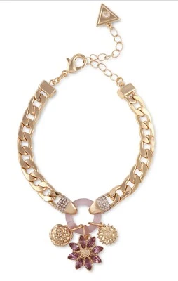Pulsera con dije de flores de cristal púrpura tono dorado Guess Foto 1 de 2