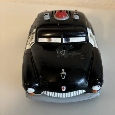 Disney Pixar Cars Sheriff Radiador Muelles, Habla y Movimientos Foto 1 de 4