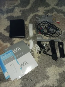 Console Nintendo Wii con controller cavi e manuali non testata - Foto 1 di 5