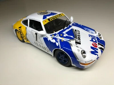 Coche de colección Burago 1/24 Porsche Carrera 911 1993 Italia Foto 1 de 4