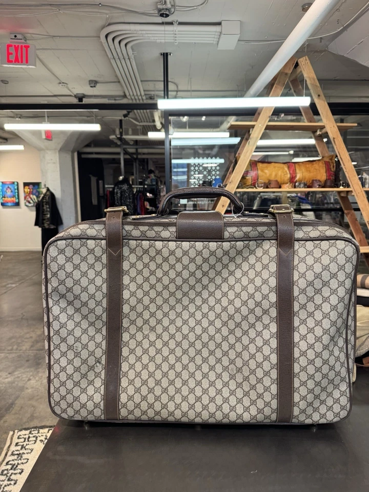 Bolsa de viaje GUCCI x Globe Trotter GG Supreme Foto 1 de 4