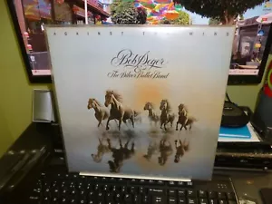 BOB SEGER & SILVER BULLET BAND. "AGAINST THE WIND" LP UK 1980. CAPITOL LABEL. - Picture 1 of 4