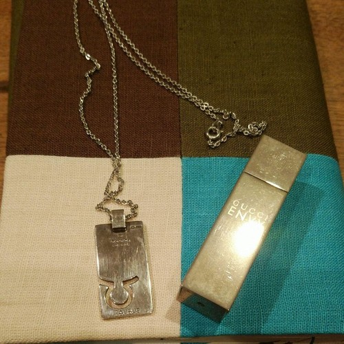 Collana e profumo Gucci placca Toro in argento 925 dal Giappone