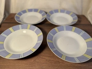 4 tiefe Teller Porzellan blau gelb gemustert - Bild 1 von 1
