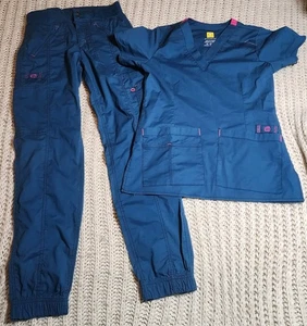 JUEGO DE EXFOLIANTE UTILITARIO WONDERWINK WONDER FLEX TALLA XS Azul Top Y Pantalones - Imagen 1 de 20