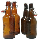 Lot vintage de 4 bouteilles de bière en verre brun 2 surpiqûres en plastique et 2 surpiqûres en céramique