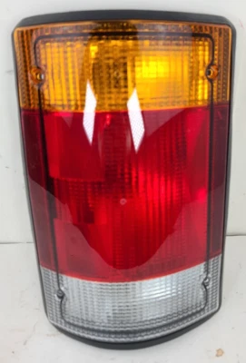 1992-1994 Ford E150 E250 E350 Econoline Van OEM Driver side LH taillight New NOS - Image 1 of 4