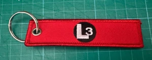 L3 Technologies Keyring embroidered double sided - Foto 1 di 2