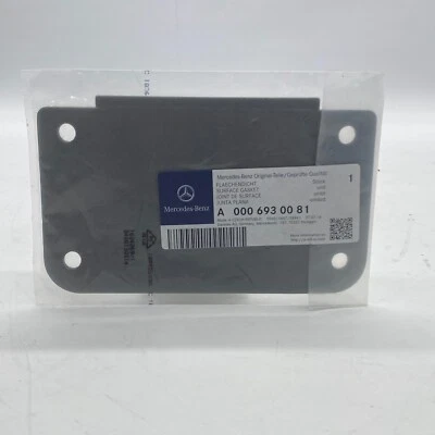 Cubierta de sello de junta de superficie gris Mercedes Benz OEM A0006930081 NUEVO Foto 1 de 4