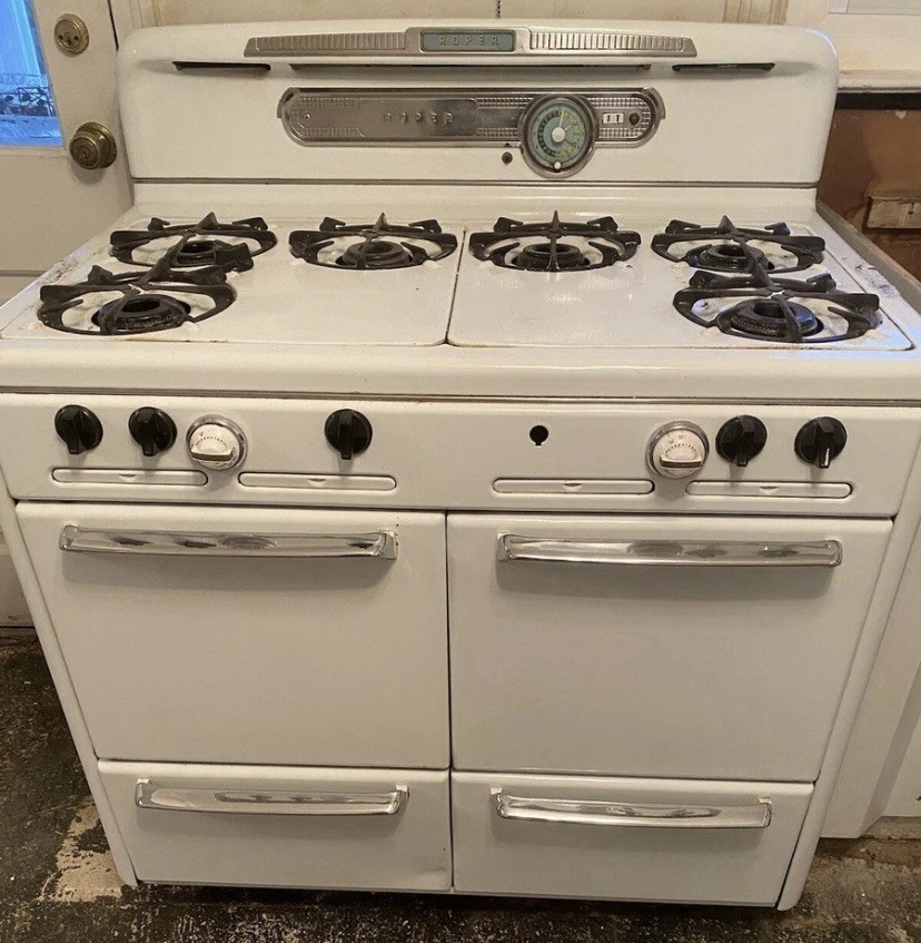 Pozos de goteo de gas de 6 quemadores capacidad extra Roper de colección 2 disponibles Foto 1 de 4