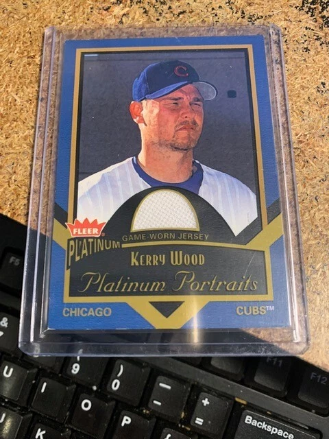 2003 FLEER PLATINUM JERSEY CARD KERRY WOOD PLATINUM PORTRAITS  - Image 1 of 1