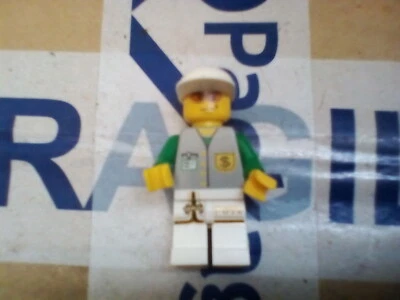 Mini figura de Lego comerciante de acciones con gorra blanca Foto 1 de 3