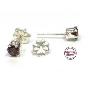 Orecchini a perno con zirconi marrone cioccolato 4 mm - Foto 1 di 3