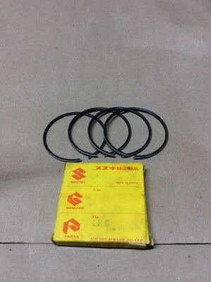 1969-71 SUZUKI T250 PISTON RING SET 1.0 O/S  OEM NOS 12140-18730 - Image 1 of 3