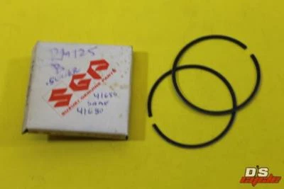Suzuki NOS RM125, 1977, juego de anillos de pistón, 0,50 mm sobre, # 12140-41650 Foto 1 de 3