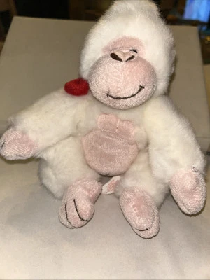 Gordon The Baby White Gorilla con lazo rojo Foto 1 de 3