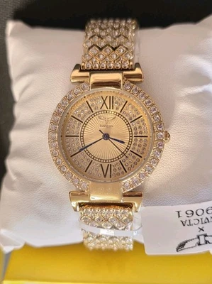 Reloj para mujer Invicta Wildflower tono dorado. Nuevo con caja sin papeles Foto 1 de 4