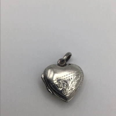 Colgante medallón corazón plata de ley grabado Foto 1 de 4