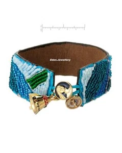 Stunning Disney Couture POCAHONTAS Bracelet Beaded Crystal Teepee Compass Charms - Picture 1 of 1