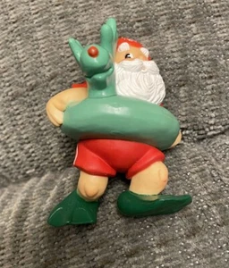 SONNE & SPASS WEIHNACHTSMANN 1985 ENTSPANNT AM STRAND WENN ER VON DER HALLMARK ORNAMENT ist - Bild 1 von 9