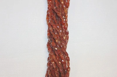 Piedra genuina - 4x6 - Cuentas de arroz facetadas - Dos (2) hebras de 14 a 15" de largo  Foto 1 de 2