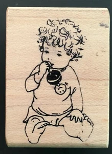 Lockiges Baby sitzendes spielendes Rasselspielzeug Magenta Holz Stempel - Bild 1 von 6