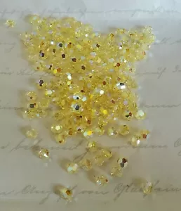 Swarovski Crystal 5000 4mm round beads, Jonquil AB2X (24pcs) - Picture 1 of 2