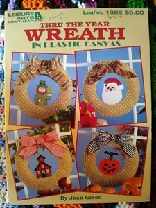 Leisure Arts | 1692 | Plastic Canvas | Thru The Year Wreath in Plastic Canvas - Picture 1 of 2