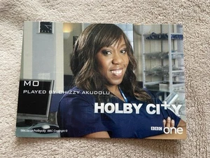 CHIZZY AKUDOLU (HOLBY CITY) UNSIGNED BBC CAST CARD - Picture 1 of 2