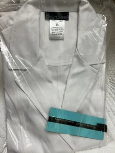 WOMENS CHEROKEE WHITE LAB COAT 36” 2410 - SIZE XS - NEW WITH TAGS - Picture 1 of 7