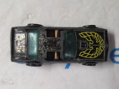 Pontiac Firebird vintage 1977 Hot Wheels Hot Bird transmisión automática paredes negras Hong Kong Foto 1 de 4