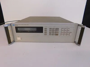 HP HEWLETT PACKARD 6624A SYSTEM DC POWER SUPPLY (TYK44) - Picture 1 of 10