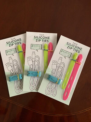 Three (3) pack silicone zip ties, 2 large, 1 small, blue, yellow, pink - Image 1 of 2