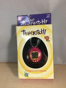 Used Bandai Original TamaGotchi Pink and Yellow, 1996 - 1997 English - Picture 1 of 6